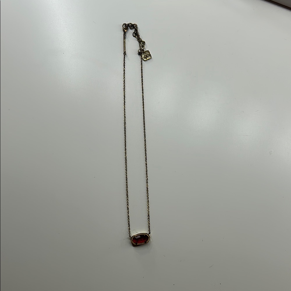 kendra scott Elegant Gold Necklace with Red Gemstone
